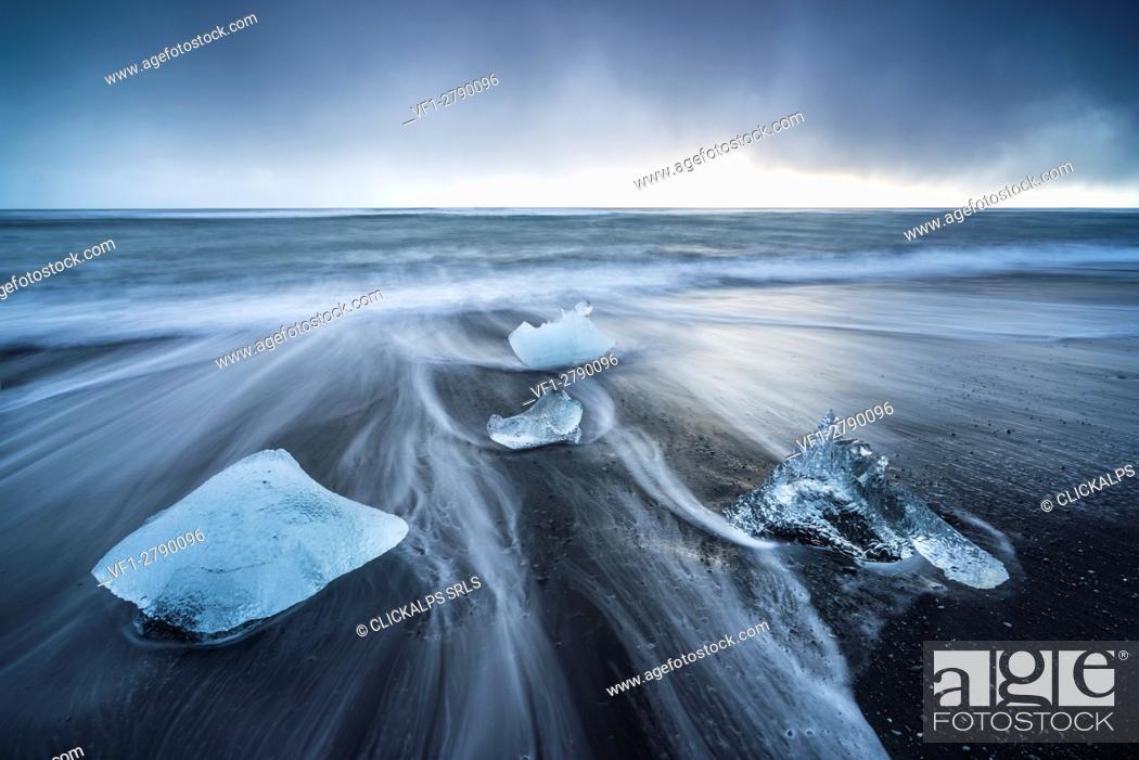 Stock Photo: Ice blocks on the black sand beach in Jokulsarlon Glacier Lagoon, Eastern Iceland, Europe.