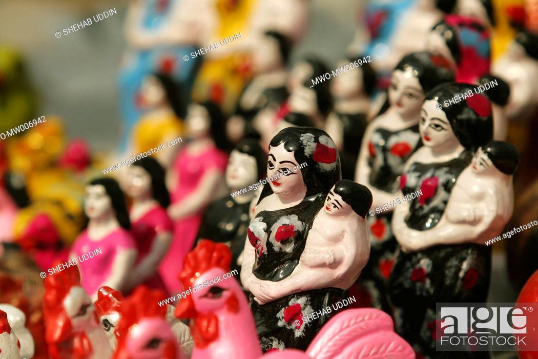 Stock Photo: Clay models for sell at a fair during the Eid-ul-Adha festival in a village Mayshaghuni, Rupsha, Khulna, Bangladesh January 01.