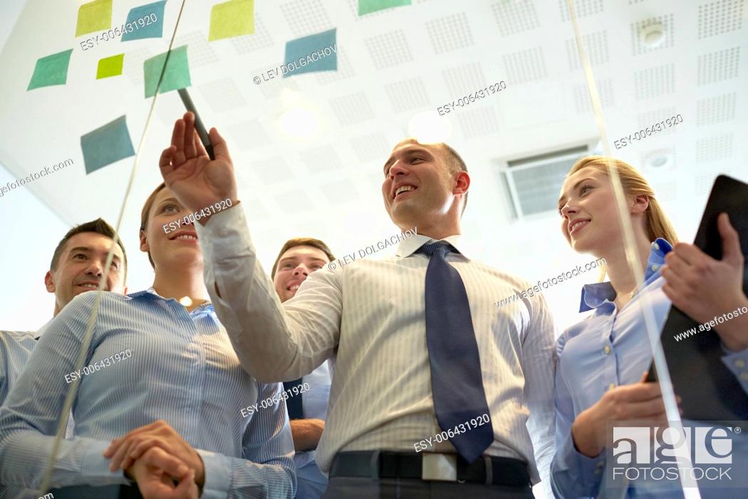 Stock Photo: business, people, teamwork and planning concept - smiling business team with marker and stickers working in office.