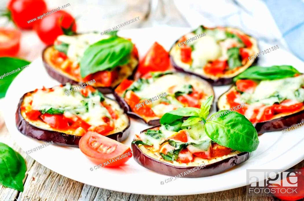 Stock Photo: pizza eggplant with tomatoes and Basil.