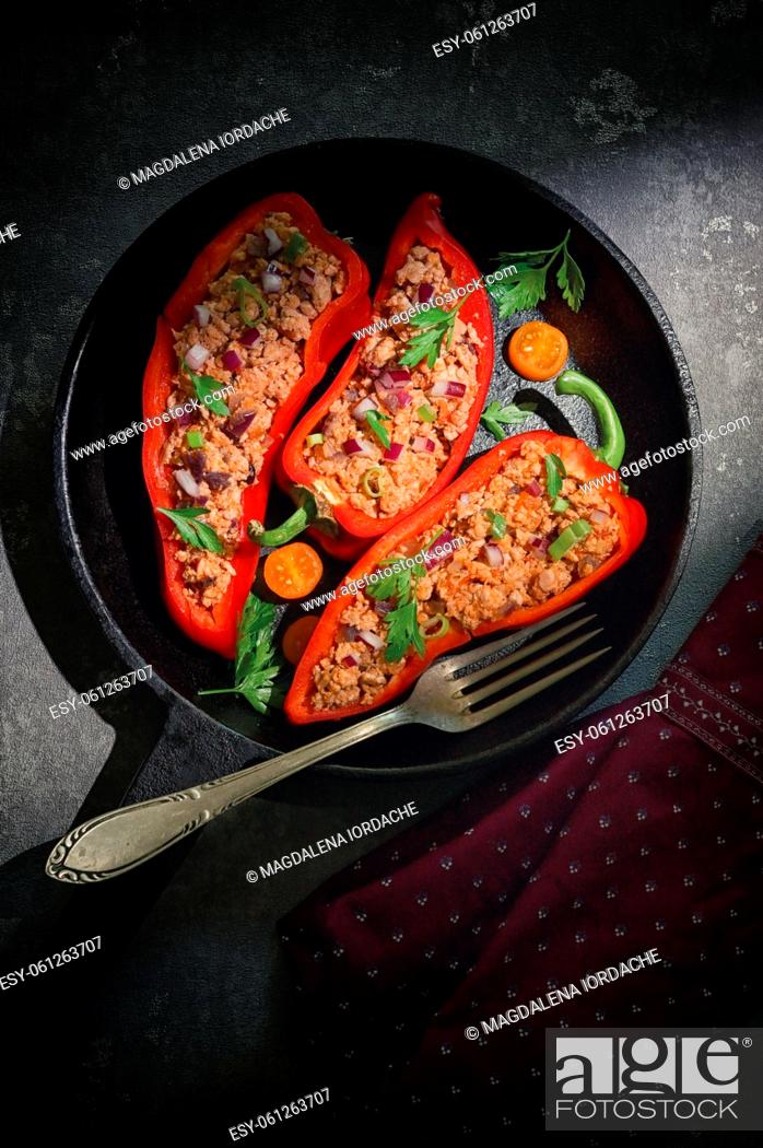 Stock Photo: Red Bell Stuffed with Minced Meat and Vegetables in Pan.
