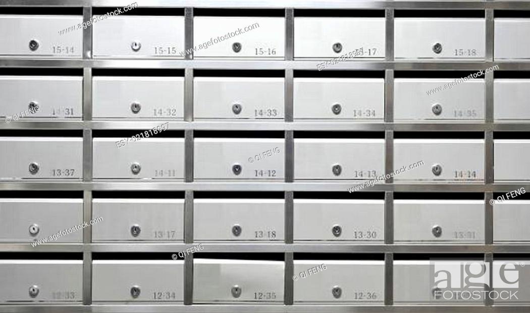 Stock Photo: metallic mailbox array tidy inside apartment houses.