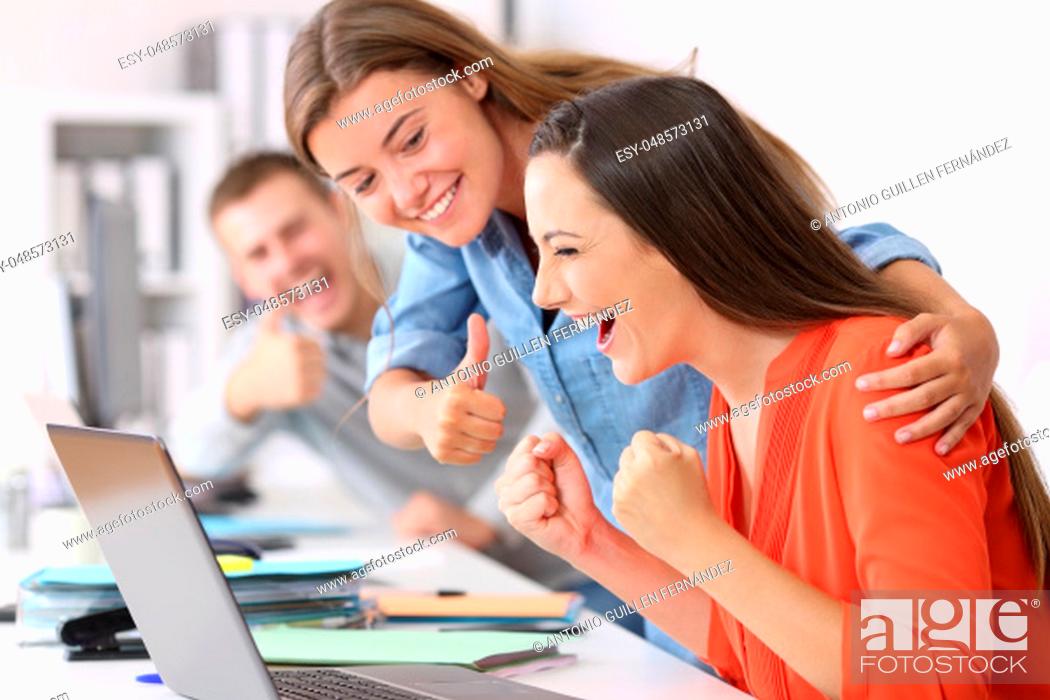 Stock Photo: Happy employee being congratulated by colleagues after success at office.