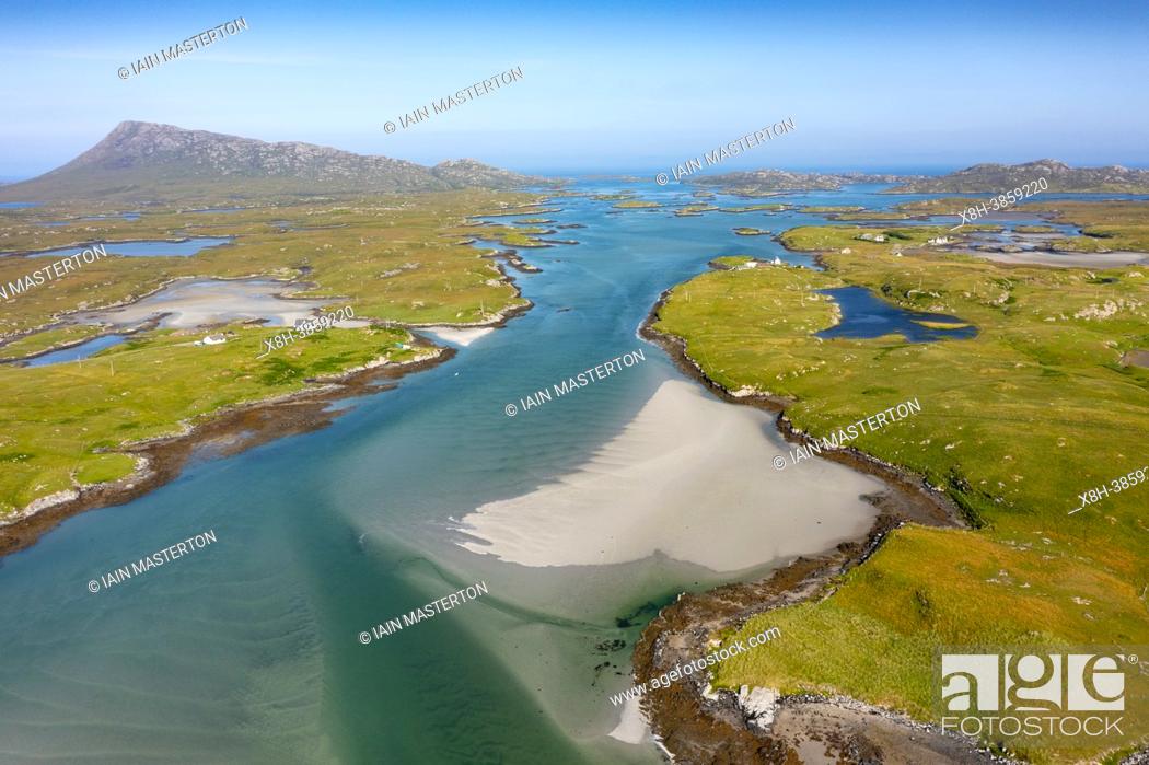 Stock Photo: Aerial view from drone of coastal landscape on Benbecula with Eaval mountain on the left in the Outer Hebrides, Scotland, UK.