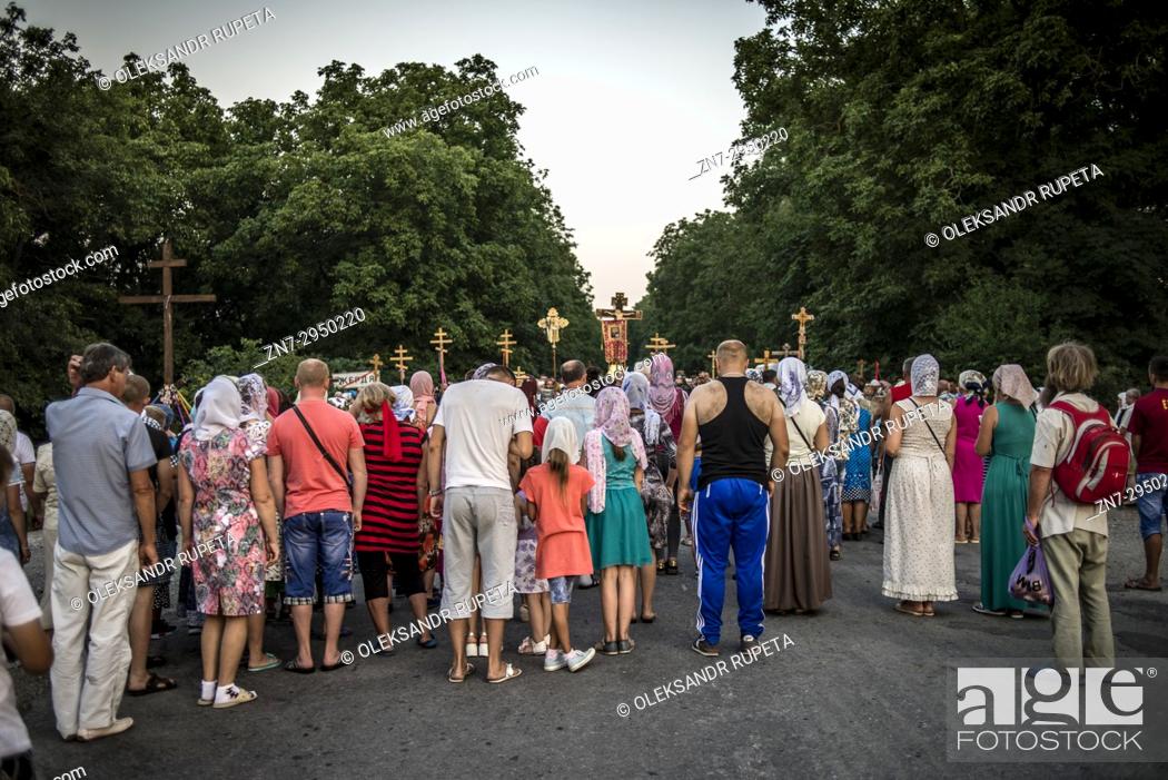 Stock Photo: Cross Procession from Kamianets-Podilsky to the Holy Dormition Pochaev Lavra, August 19 - 25, 2017, Ukraine. For more than 150 years the procession gathered.