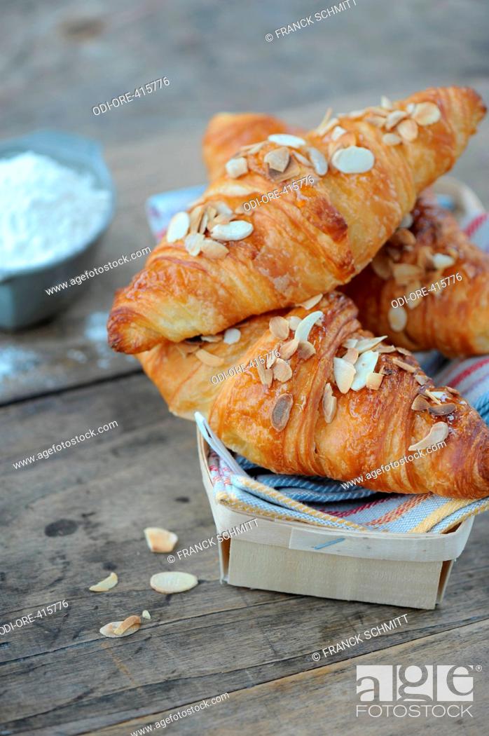 Stock Photo: Butter, honey and almond croissants.