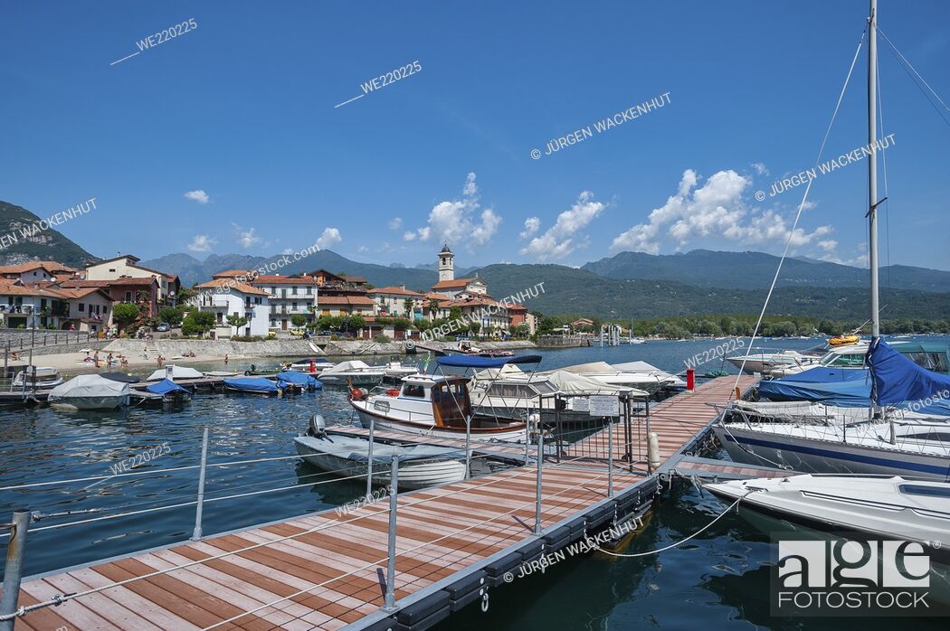 Stock Photo: Small harbor with town view, Feriolo, Piedmont, Italy, Europe. Small harbor in front of the village of Feriolo on Lake Maggiore.