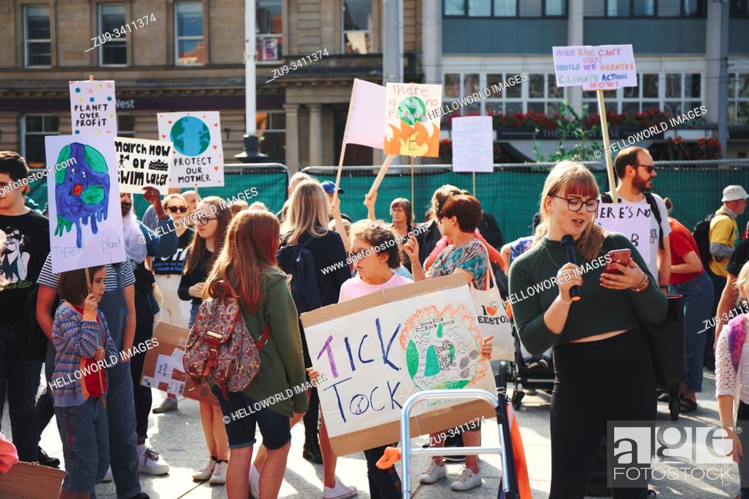 Stock Photo: Young climate change protester speaking at the 20th September global climate strike, old Market Square, Nottingham, Nottinghamshire, East Midlands, England.