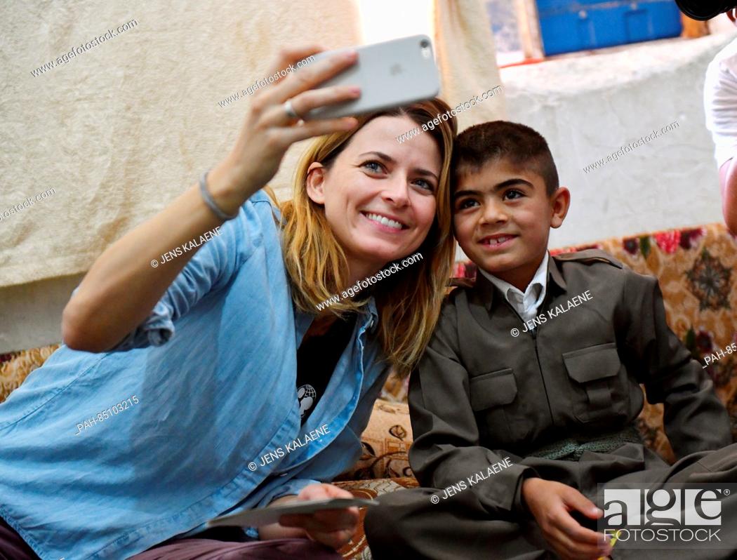 Stock Photo: EXCLUSIVE - UNICEF ambassador Eva Padberg visits the family of nine-year-old Murat in a refugee camp for Syrian refugees in the Dohuk region, Iraq.