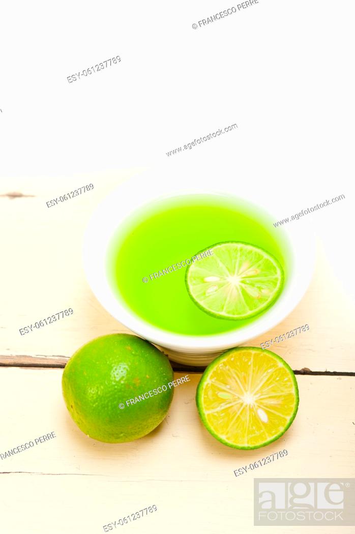 Stock Photo: fresh and healthy green lime lemonade macro closeup.