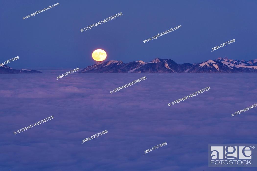 Stock Photo: View of full moon above Jachenau from Simetsberg Mountain, near Wallgau, Upper Bavaria, Bavaria, Germany.