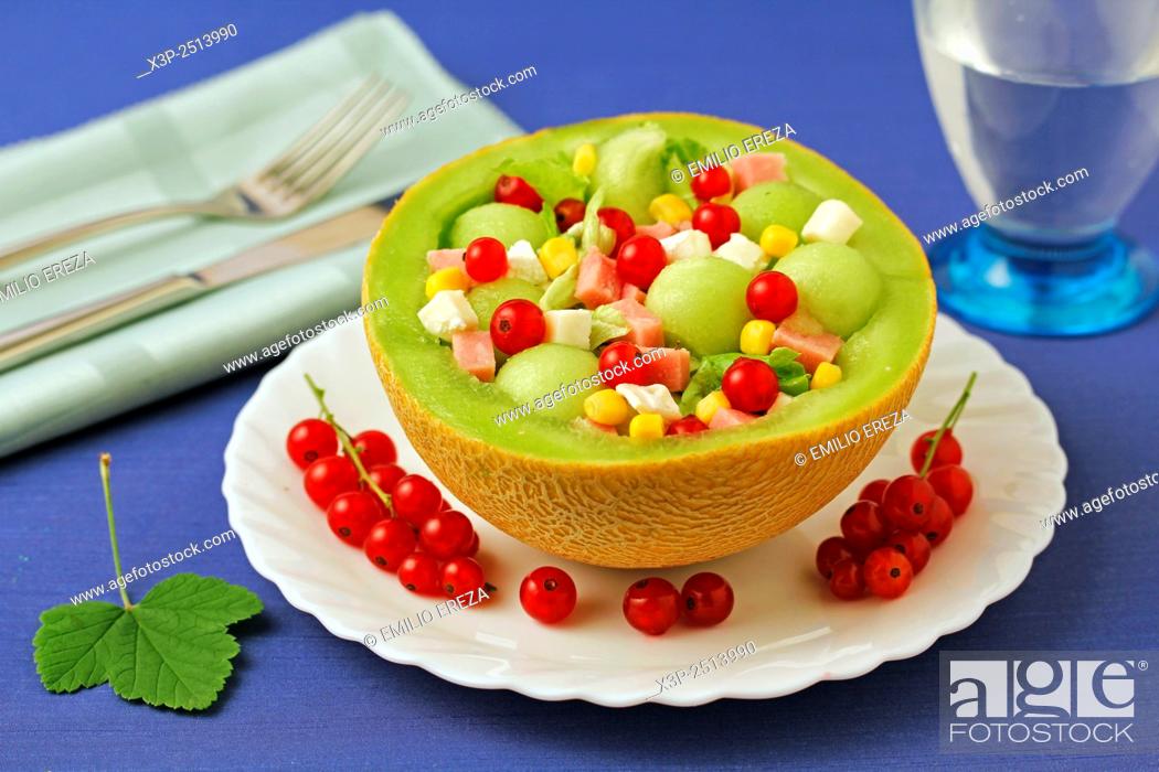 Stock Photo: Melon salad with red currants.