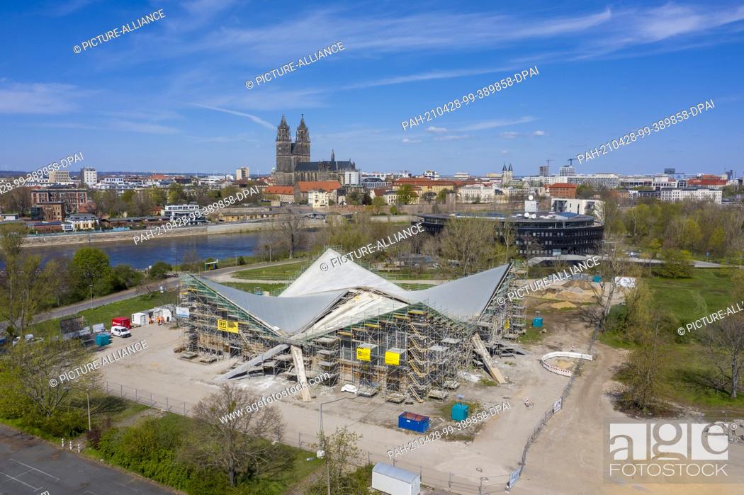 Stock Photo: 27 April 2021, Saxony-Anhalt, Magdeburg: View of the Hyparschale in Magdeburg. The listed building is currently being renovated.