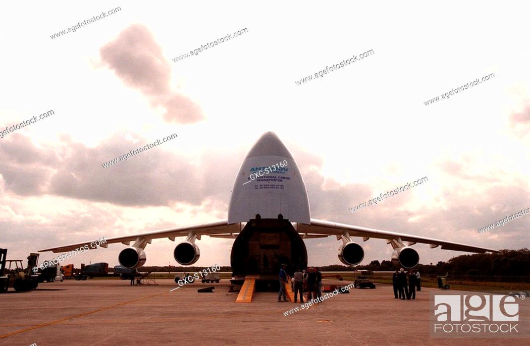 Stock Photo: 03/06/1999 --- After delivering a French satellite for the EUTELSat Consortium, a Russian cargo plane, the Antonov 124, sits on the end of the Shuttle Landing.