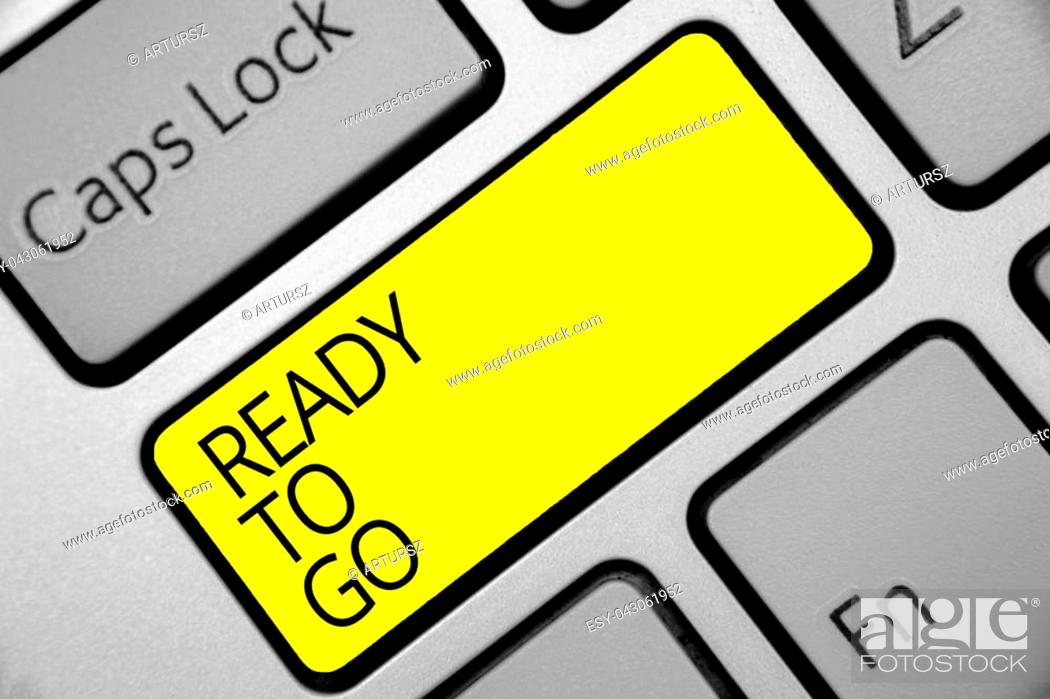 Stock Photo: Text sign showing Ready To Go. Conceptual photo Are you prepared for the future travel trip mission start Keyboard yellow key Intention create computer.
