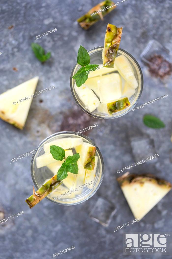Stock Photo: Water flavoured with pineapple and mint.