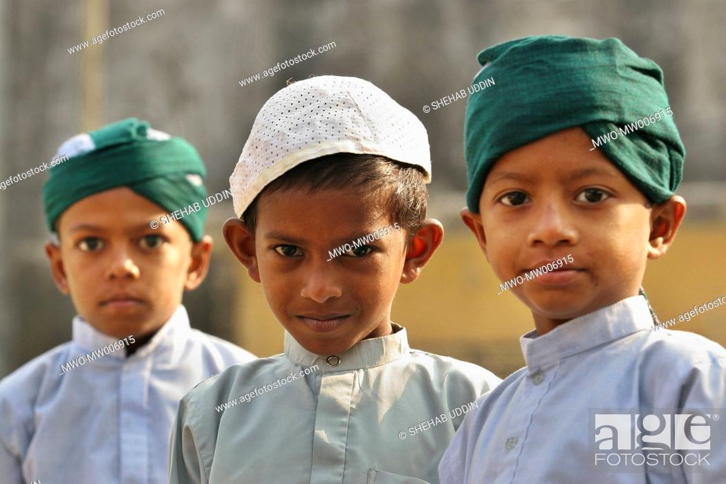Stock Photo: Portrait of Muslim children during the Eid-ul-Adha festival Mayshaghuni, Rupsha, Khulna, Bangladesh January 01, 2007 Eid-ul-Adha is one of the two main Muslim.