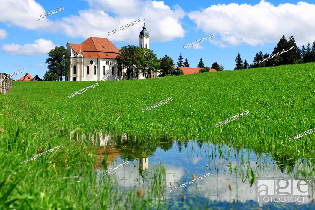 Stock Photo: Wieskirche reflected in a puddle, Steingaden, Upper Bavaria, Bavaria, Germany, Europe.