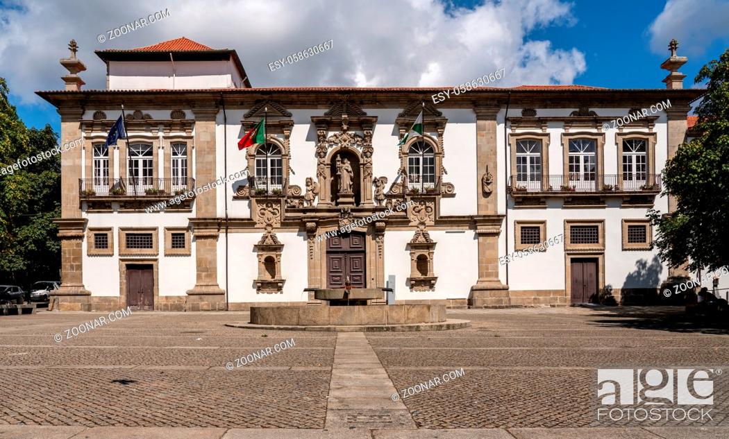 Stock Photo: Guimaraes, Portugal - 18 August 2019: Courtyard and facade of the City or Town hall of Guimaraes in northern Portugal.