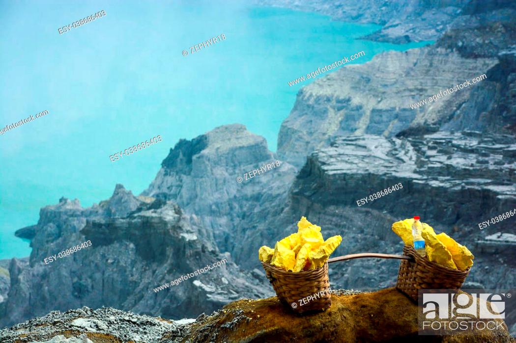 Stock Photo: Baskets with sulphur (sulfur) at Kawah Ijen volcano crater, East Java, Indonesia.
