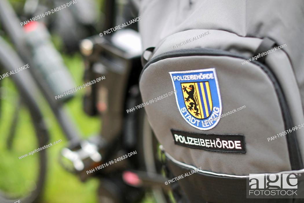 Stock Photo: 15 May 2019, Saxony, Leipzig: A bicycle of the new bicycle squadron of the Ordnungsamt Leipzig stands in the Johannapark.