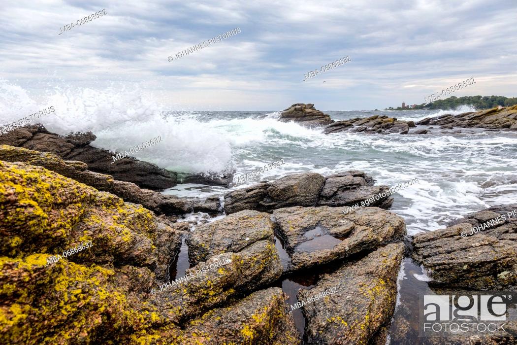 Stock Photo: The stormy Baltic Sea at the harbour of Svaneke, the lighthouse (Svaneke Fyr) in the background, Europe, Denmark, Bornholm,.