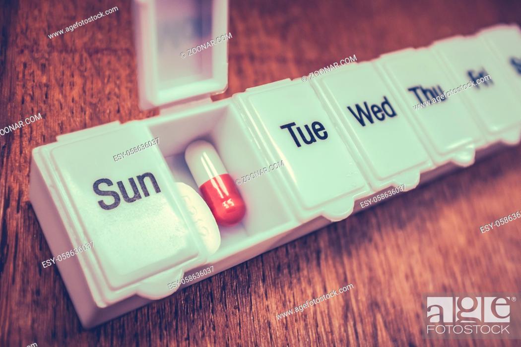Stock Photo: Health-care Image Of A Daily Pill Box To Organise Medication.