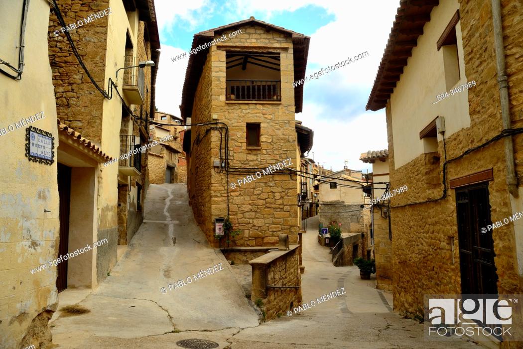 Stock Photo: Curious building between streets in La Fresneda, Matarraña, Teruel, Spain.