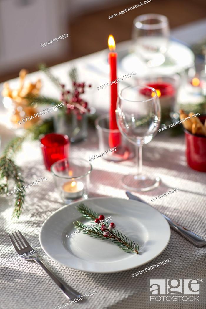 Stock Photo: christmas dinner party table serving at home.