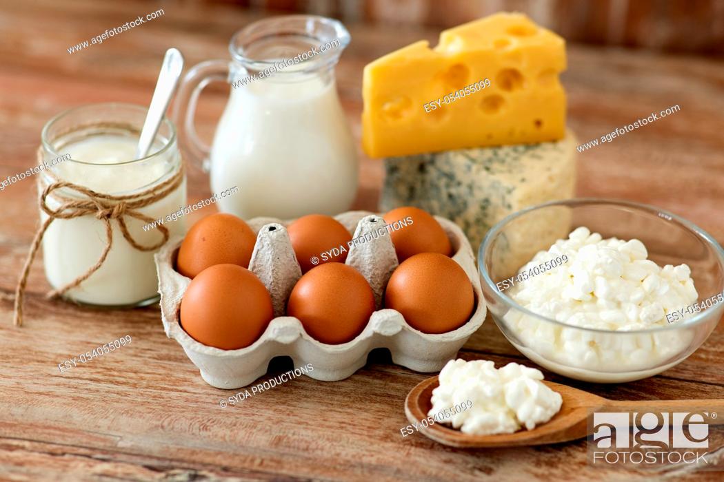 Stock Photo: cottage cheese, milk, yogurt and chicken eggs.