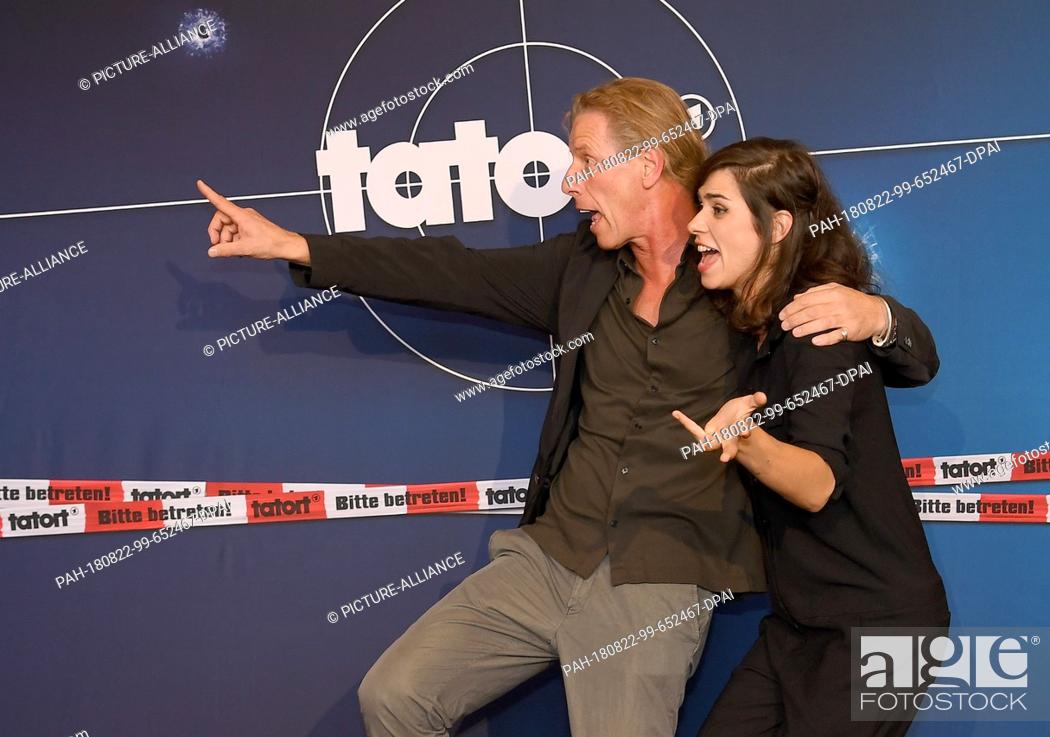 Stock Photo: 22 August 2018, Germany, Weimar: Nora Tschirner, actress and Richard Huber, director, attend the premiere of the series ""Tatort"" (lit.