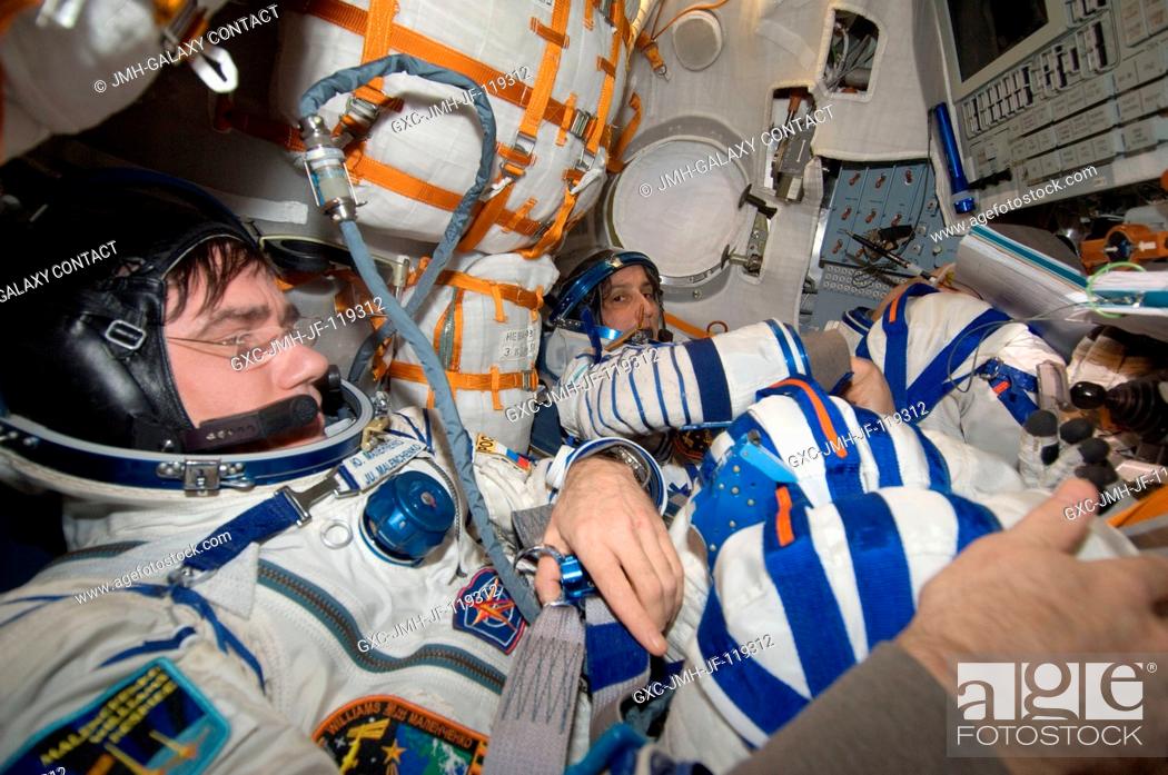 Stock Photo: Russian cosmonaut Yuri Malenchenko, Soyuz commander and Expedition 33 flight engineer; NASA astronaut Sunita Williams, Expedition 33 commander; and Japan.