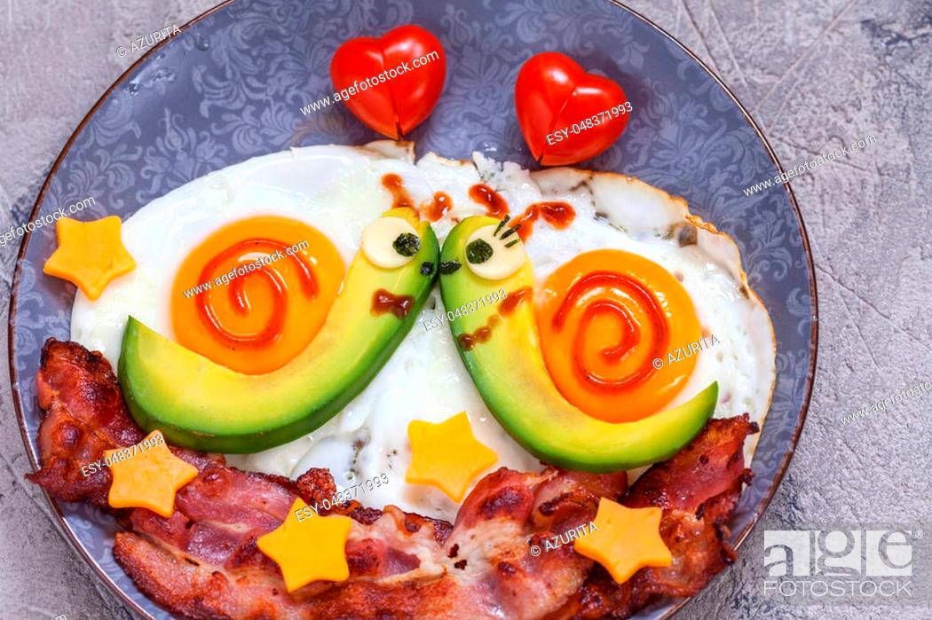 Stock Photo: Fun food. Snails breakfast for Valentine day.
