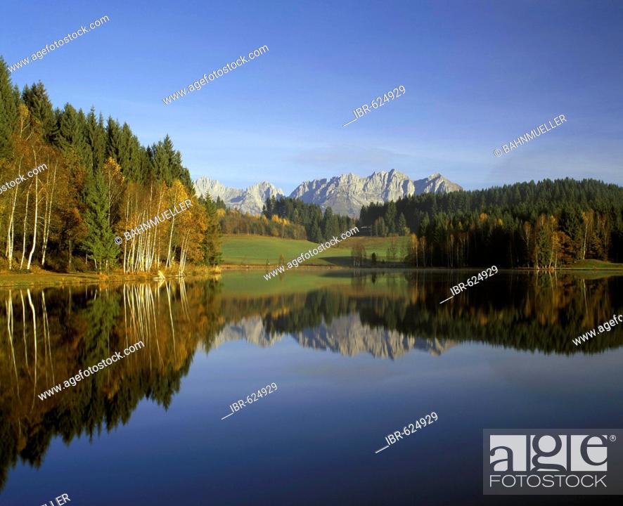 Stock Photo: Schwarzsee near Kitzbuhel Tyrol Austria in front of the Wilder Kaiser mountains.
