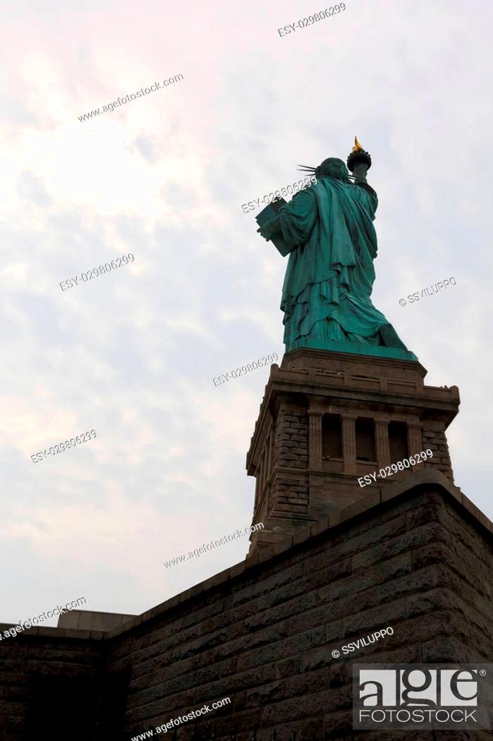 Stock Photo: The Statue of Liberty is a colossal copper statue, designed by Auguste Bartholdi, a French sculptor, was built by Gustave Eiffel.