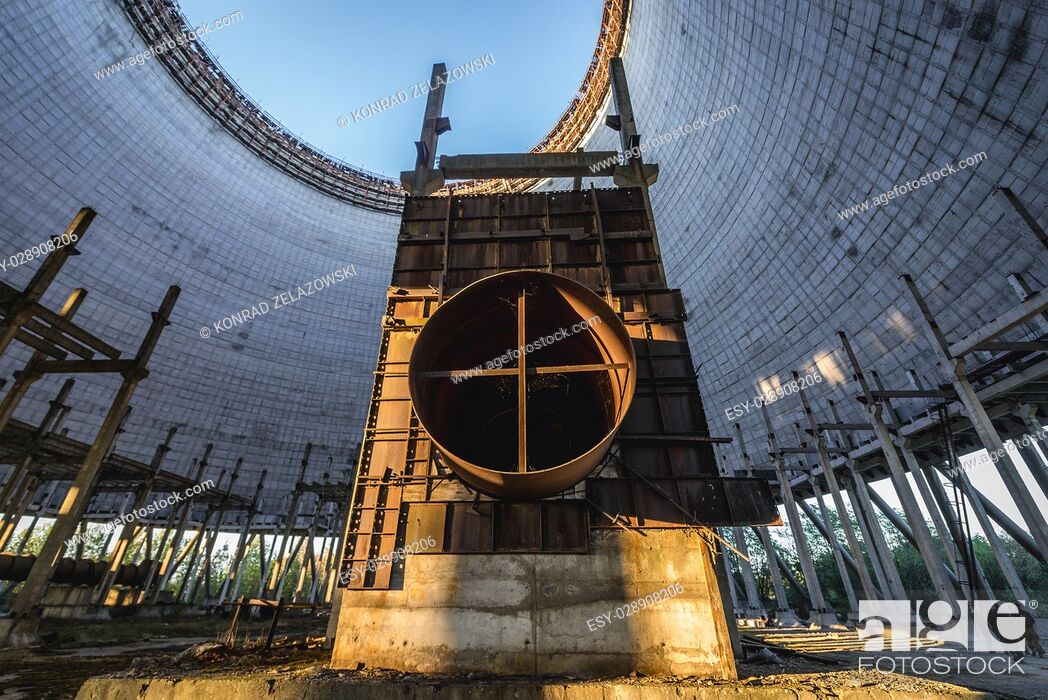 Stock Photo: Cooling tower of Chernobyl Nuclear Power Plant in Zone of Alienation around the nuclear reactor disaster in Ukraine.