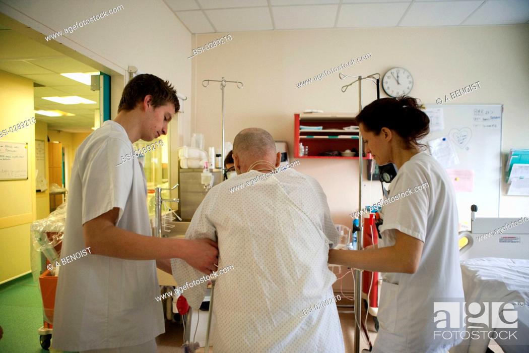 Stock Photo: Photo essay from La Croix Saint-Simon Hospital, Paris, France. Department of resuscitation. Walking exercises with the physical therapists.