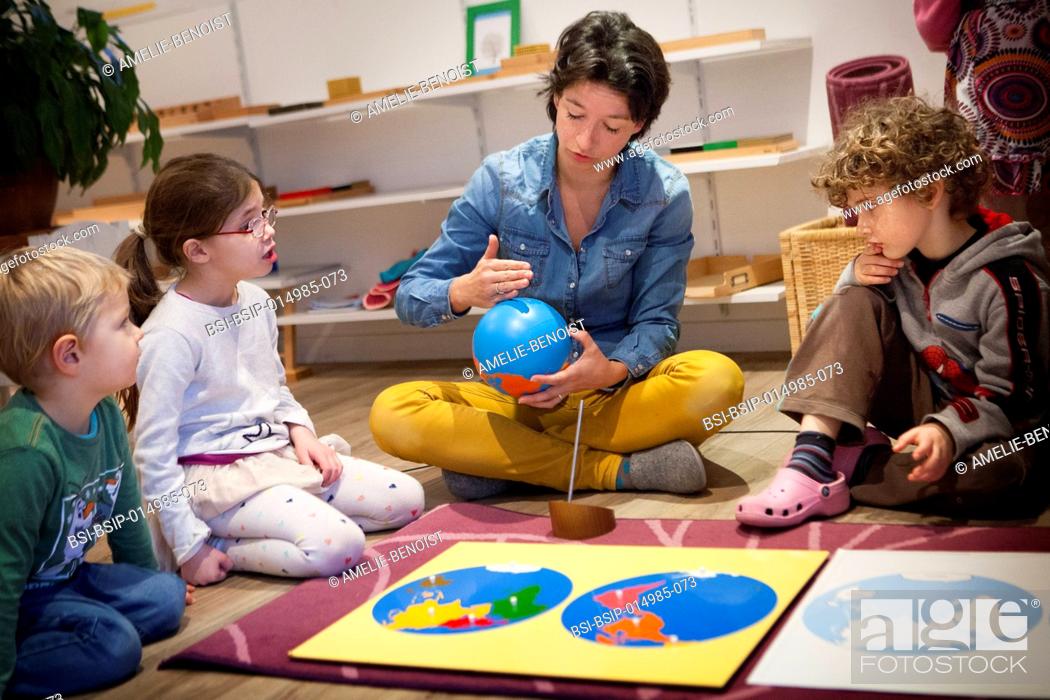 Stock Photo: Reportage in a bilingual Montessori school in Haute-Savoie, France, which caters for children from 2 to 6 years old. The 2-6-year olds are all in the same class.