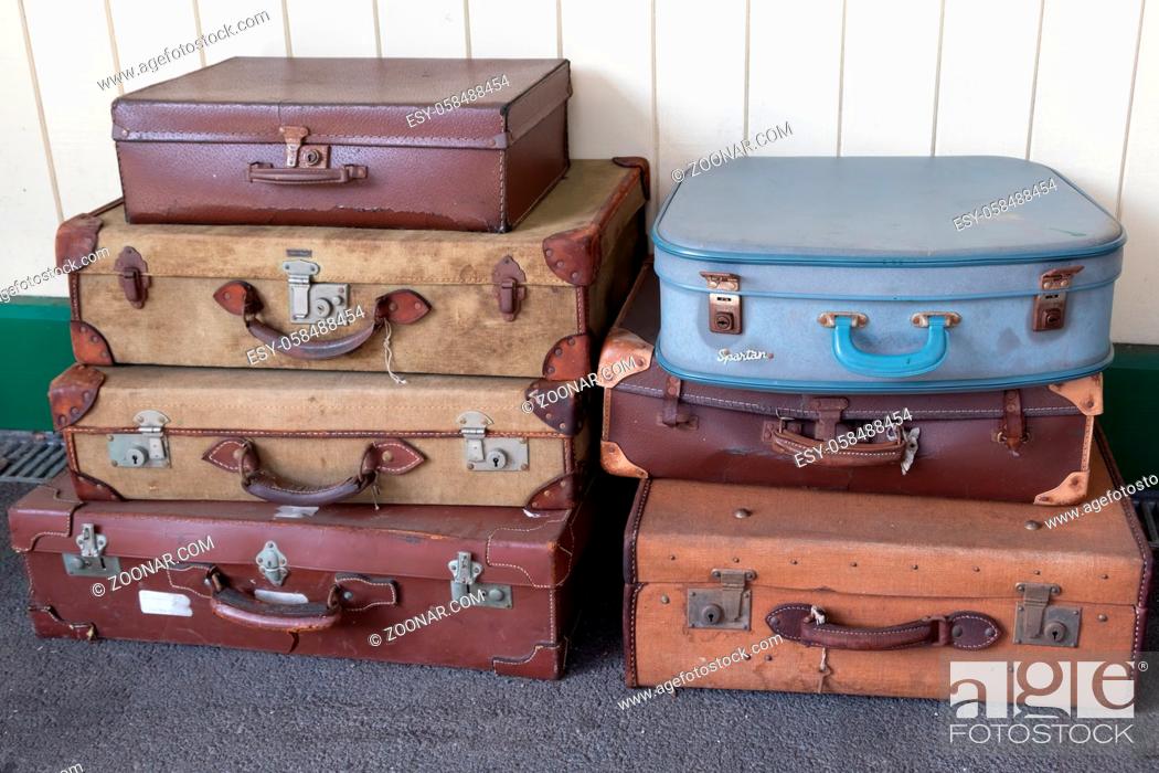 Stock Photo: EAST GRINSTEAD, WEST SUSSEX/UK - AUGUST 30 : Old suitcases at East Grinstead Bluebell railway station West Sussex on August 30, 2019.