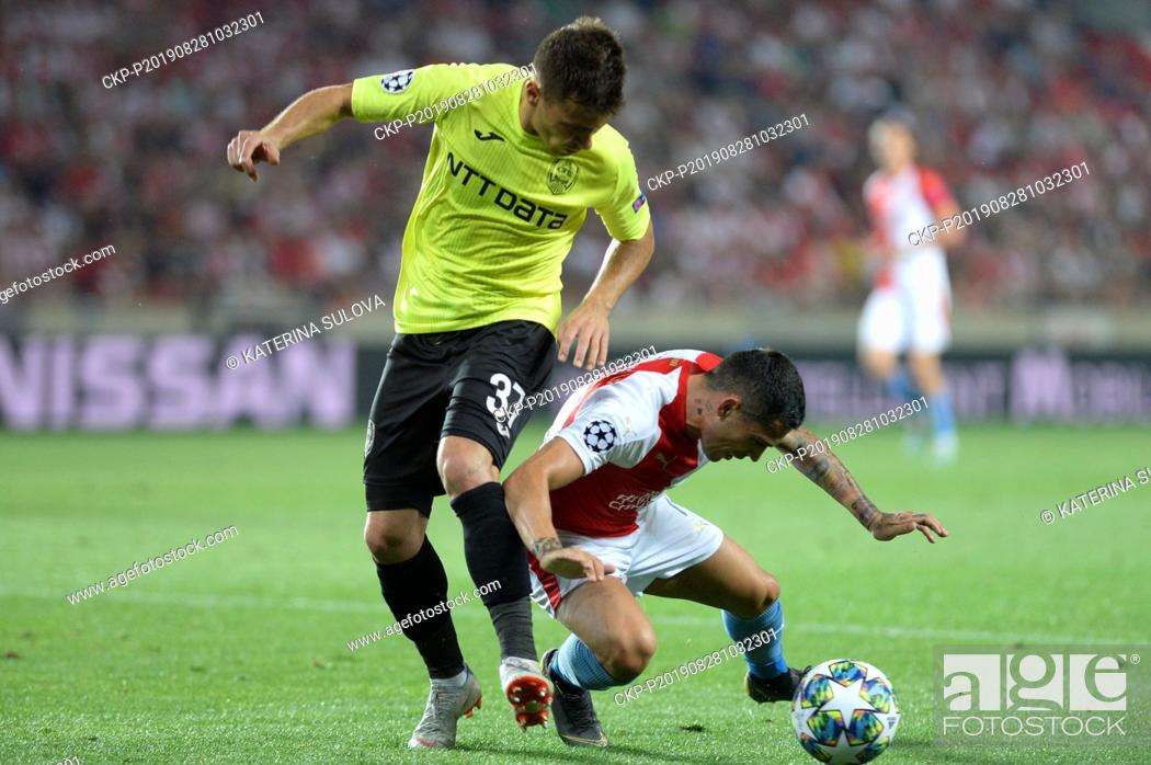 Stock Photo: From left MIHAI BORDEIANU of CFR Cluj and NICOLAE STANCIU of Slavia in action during the Football Champions' League 4th qualifying round return match: Slavia.