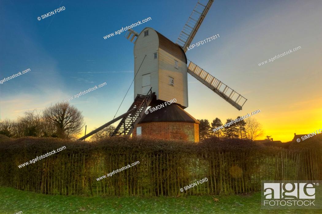 Stock Photo: England, Essex, Brentwood. Mountnessing Windmill, an early nineteenth century traditional grade II listed post mill which has been restored to full working.