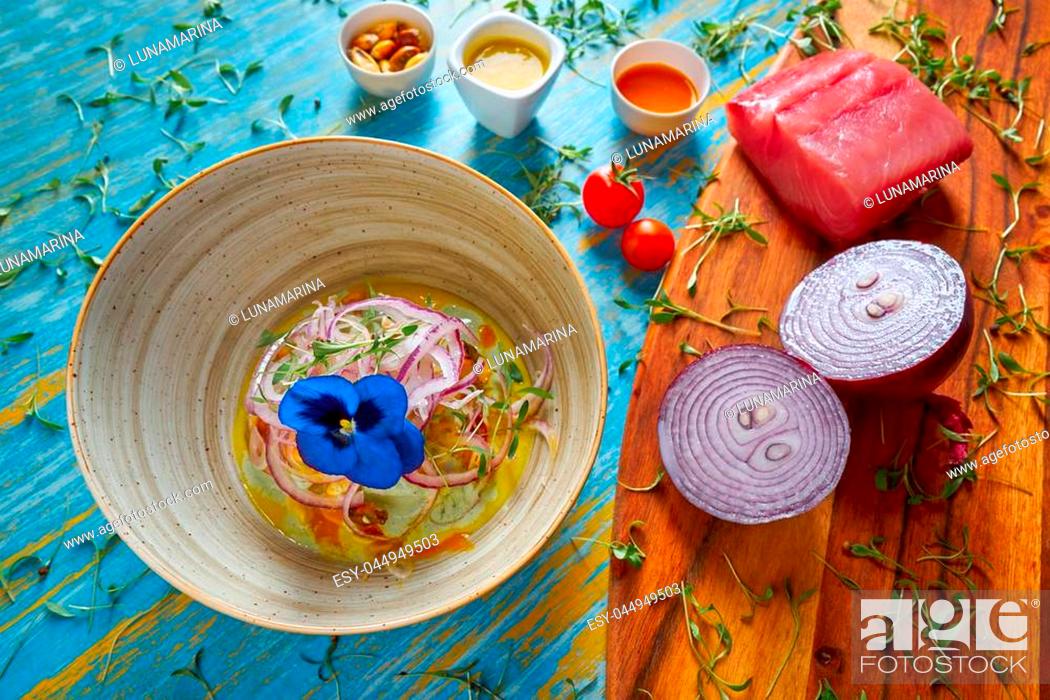 Stock Photo: Fish ceviche latin preuvian recipe on bowl with pansy flower.