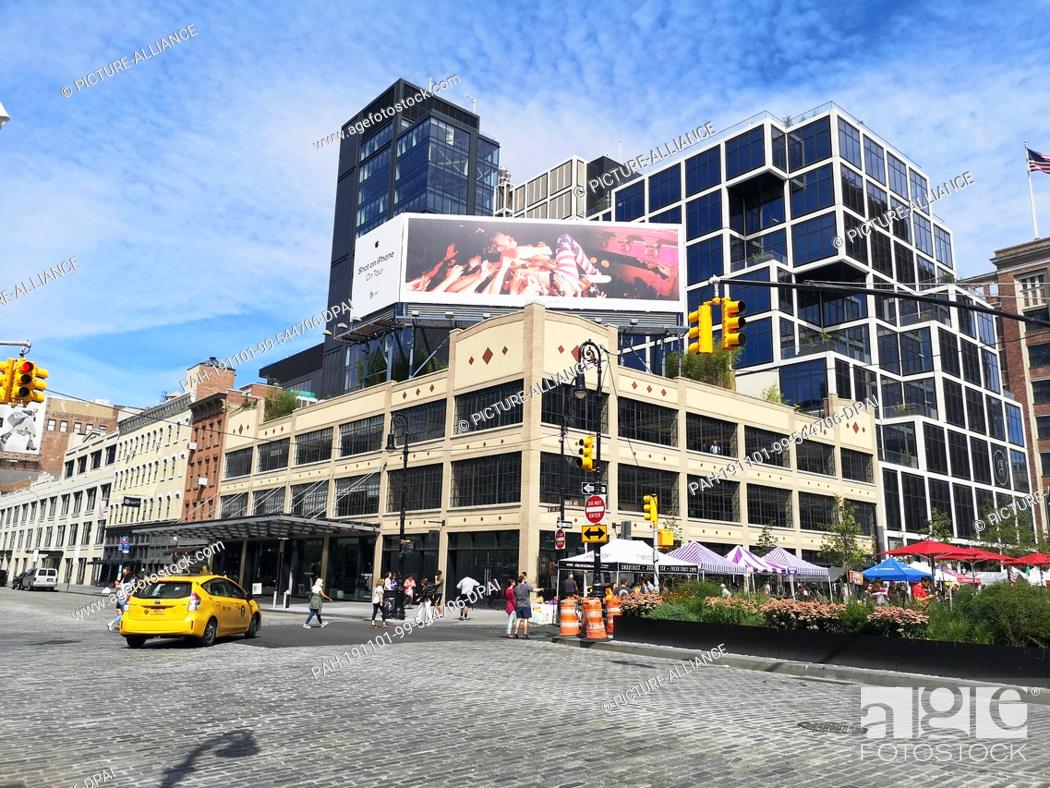 Stock Photo: 08 September 2019, US, New York: A street corner in Chelsea, Manhattan, New York. The area consists mainly of a mixture of apartment blocks and converted.