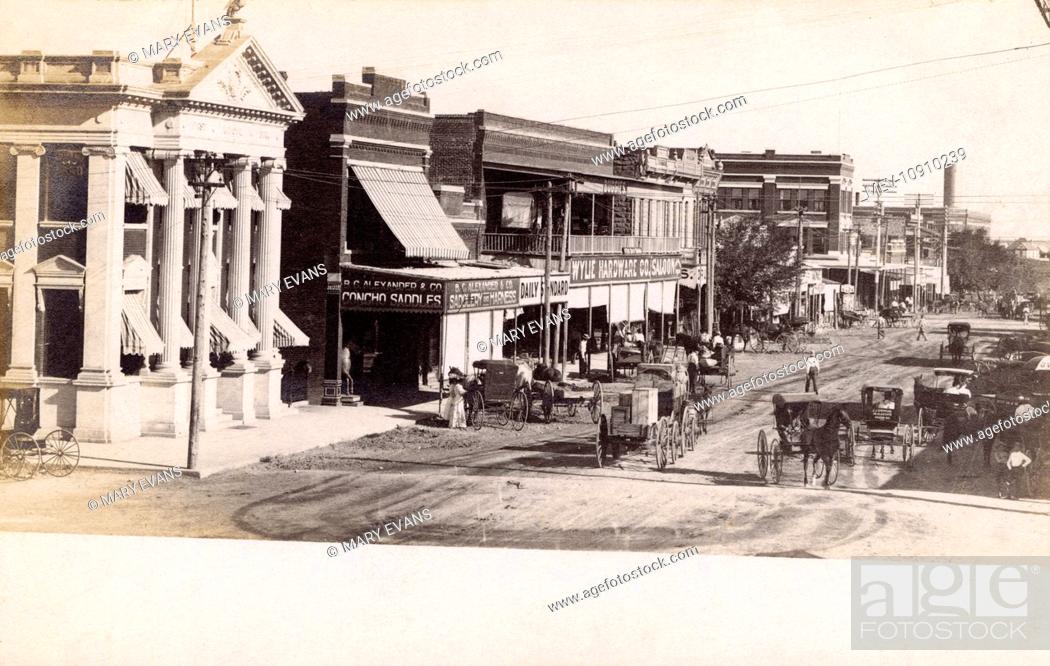 Stock Photo: Street in San Angelo, Texas, USA, showing Concho Saddles, the Daily Standard, the Wylie Hardware Co, and the First National Bank.