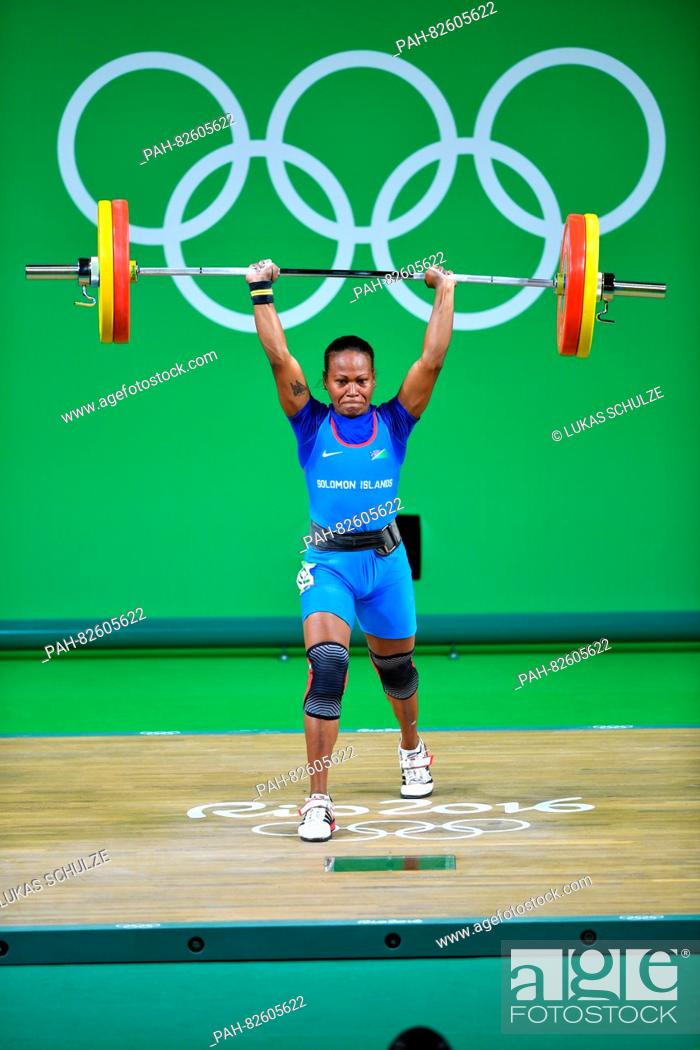 Stock Photo: Jenly Wini of the Solomon Islands competes during the Women's 58kg Group B category of the Rio 2016 Olympic Games Weightlifting events at the Riocentro in Rio.