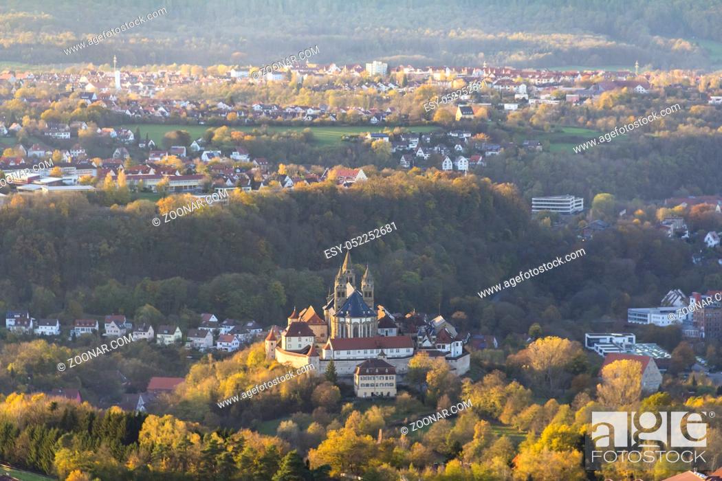 Stock Photo: high angle view including the Comburg seen from a hill named Einkorn near Schwaebisch Hall in the evening at autumn time.