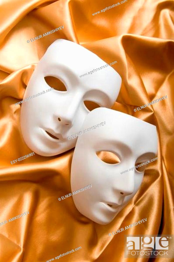 Stock Photo: Theatre concept with the white plastic masks.