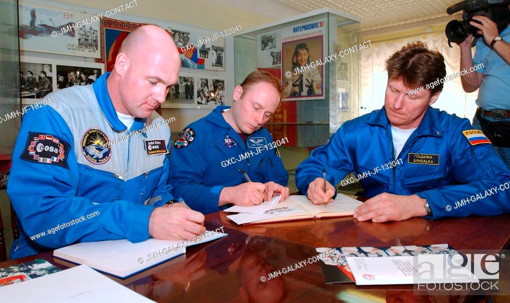 Stock Photo: European Space Agency (ESA) astronaut Andre Kuipers (left) of the Netherlands; astronaut Edward M. (Mike) Fincke (center).