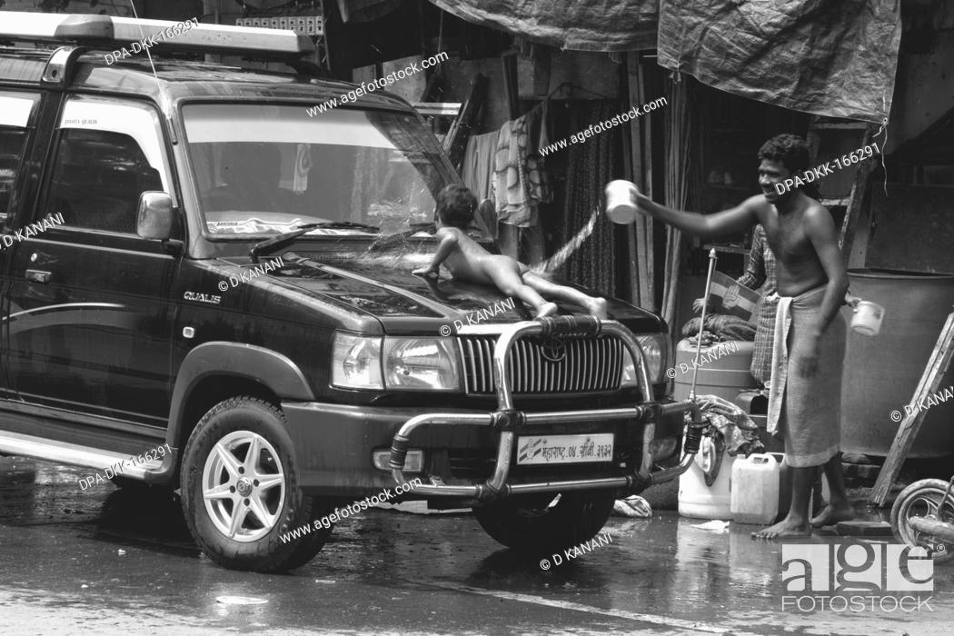 Man and naked boy washing car in Byculla slum ; N M Joshi Road ; Bombay  Mumbai ; Maharashtra ; India..., Stock Photo, Picture And Rights Managed  Image. Pic. DPA-DKK-166291 | agefotostock