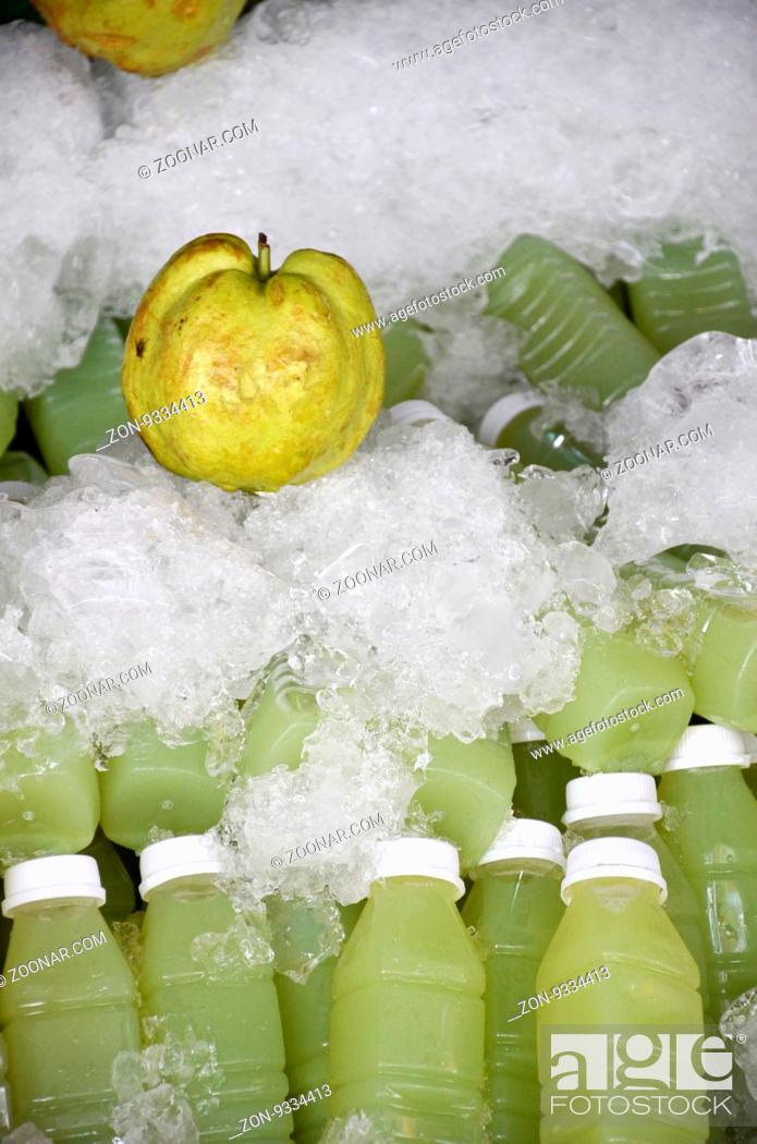 Stock Photo: Fresh guava fruit juice at the market.